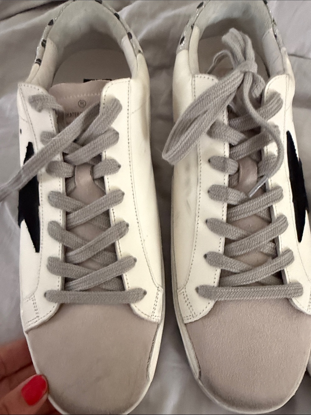 White & Gray Low-Top Sneakers with Black Star Accent
